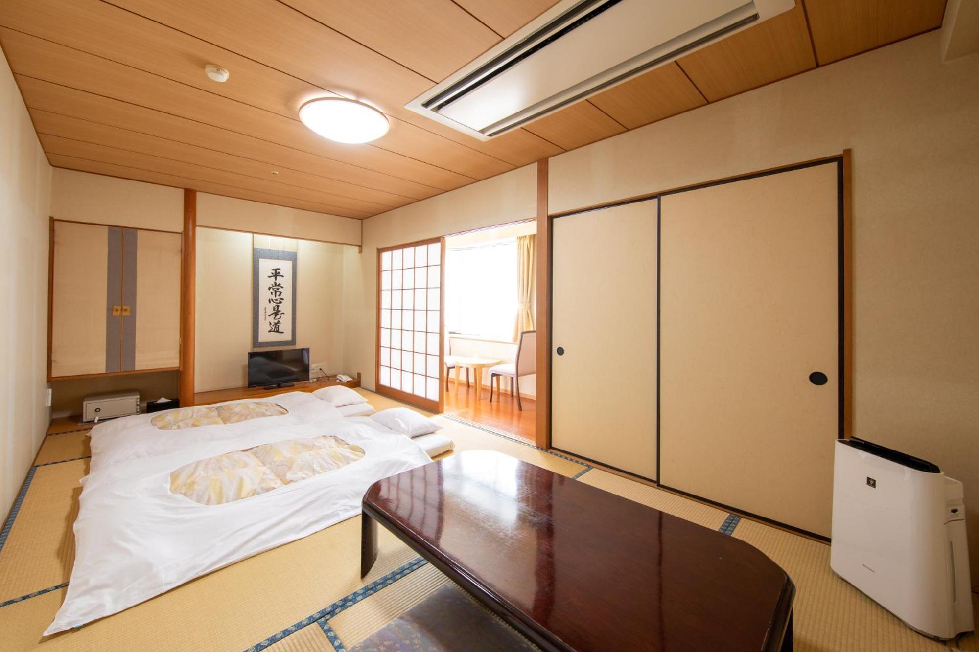 Yufuin Hotel Shuhokan Екстер'єр фото